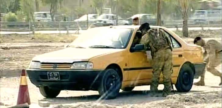 Irakisk dokusåpa skojar om bilbomber (bild från video).